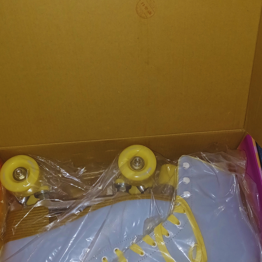 Blue and Yellow Impala Roller Skates